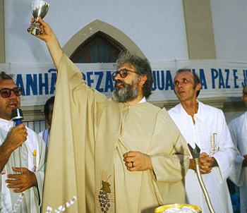 Leonardo Boff holding a chalice